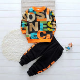 Kids Colorblock Tracksuit set featuring a vibrant pullover and black joggers, perfect for play and comfort.